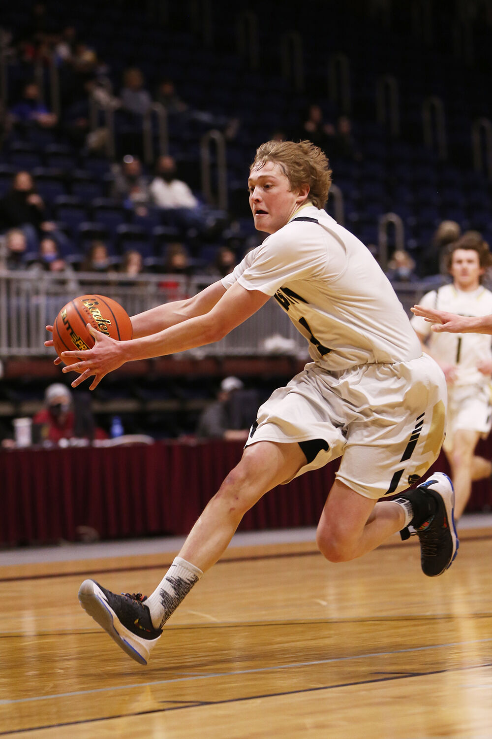 Coy Johnson reaches to save a long pass